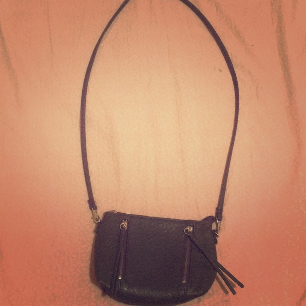 Cute and compact cross body purse. Dark grey